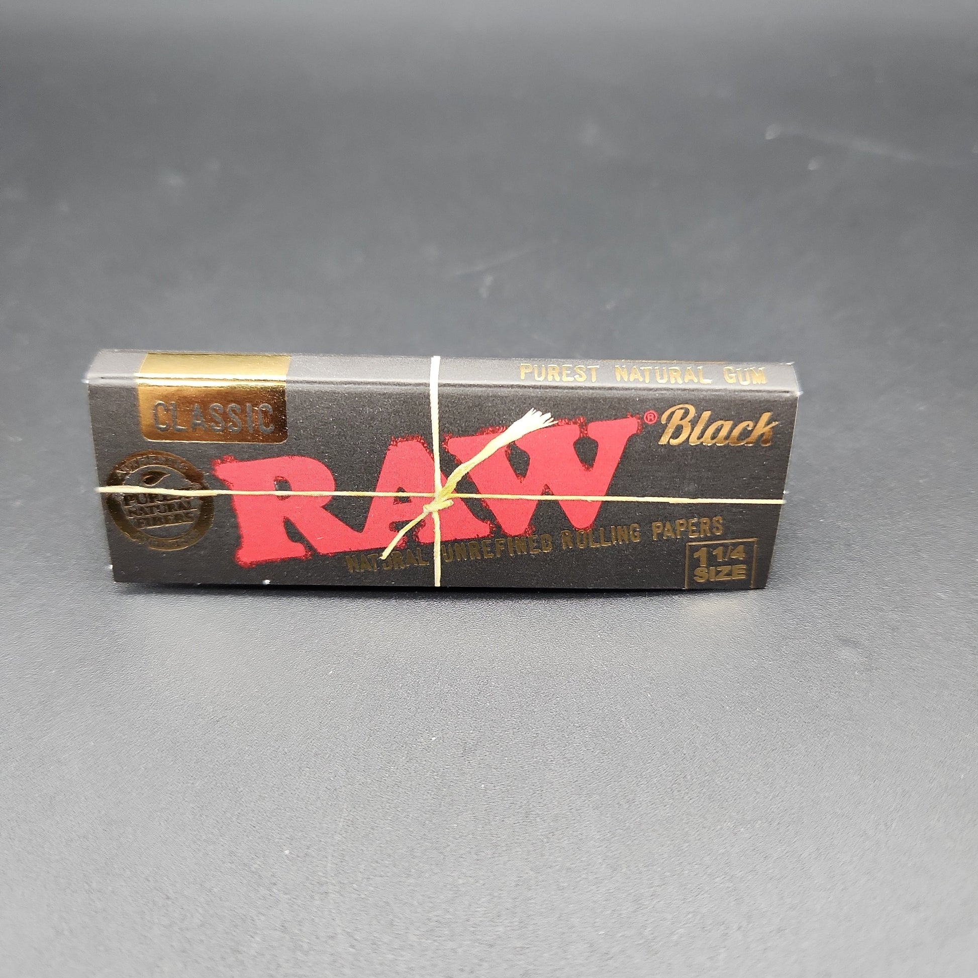 RAW Classic Rolling Papers - 1 1/4 Size Black - Avernic Smoke Shop